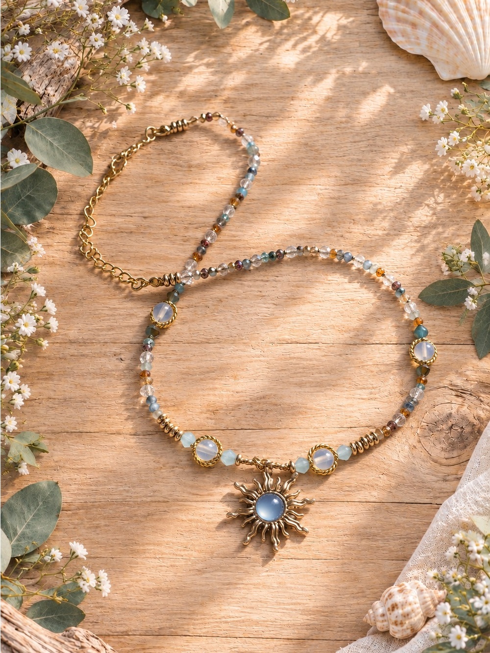 Whimsical necklace with blue toned sun pendant, handmade